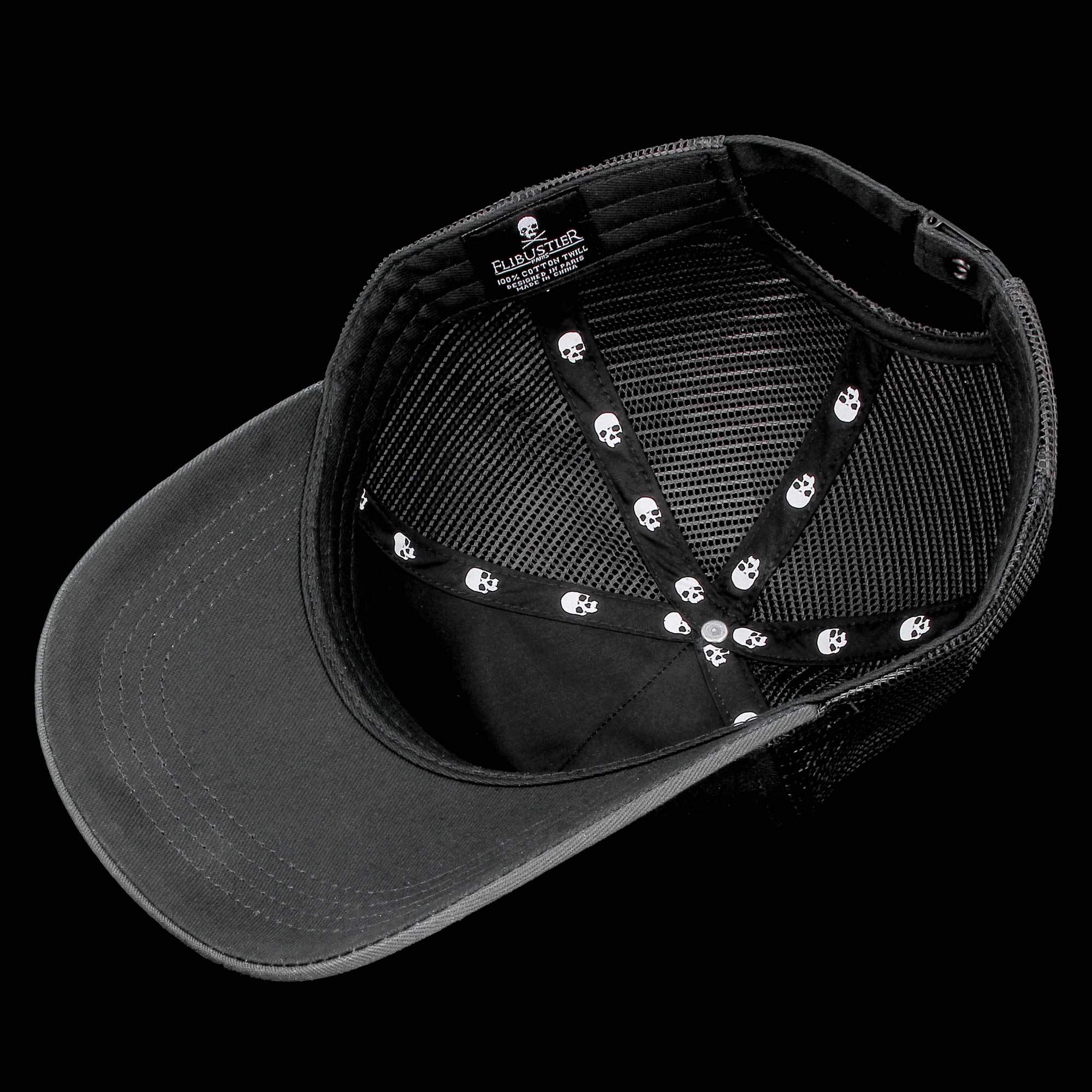 Charcoal trucker cap with 3D Jolly Roger skull embroidery